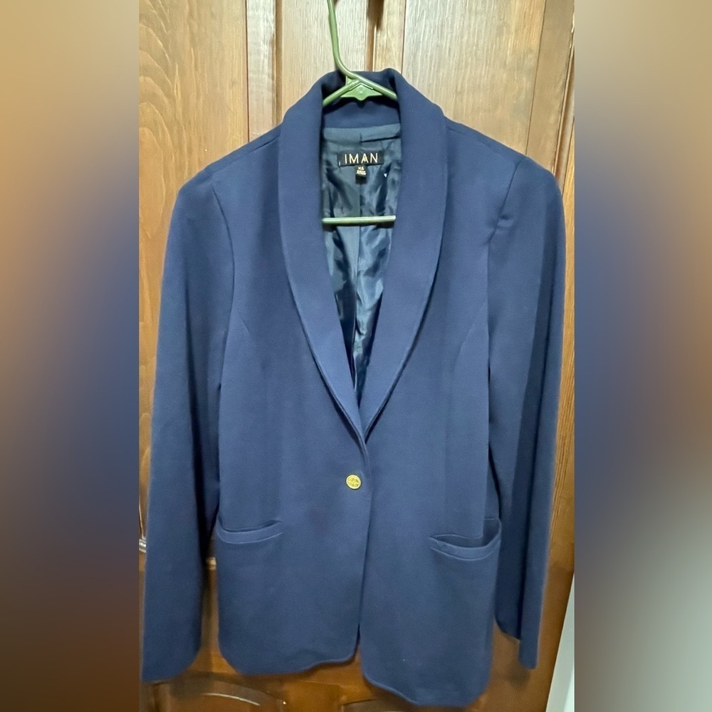 Iman women’s Navy blue knit Blazer with single button closure. Size X small